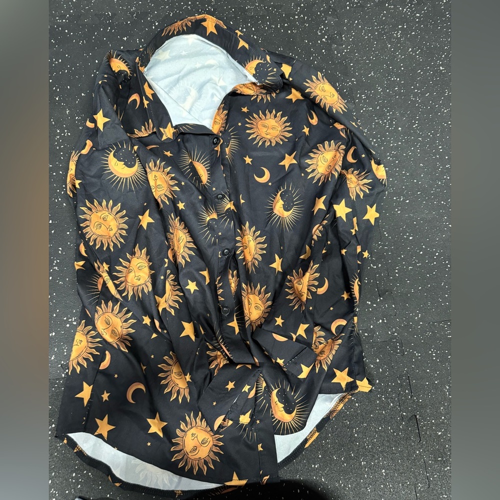 Black long sleeve silk top with sun design